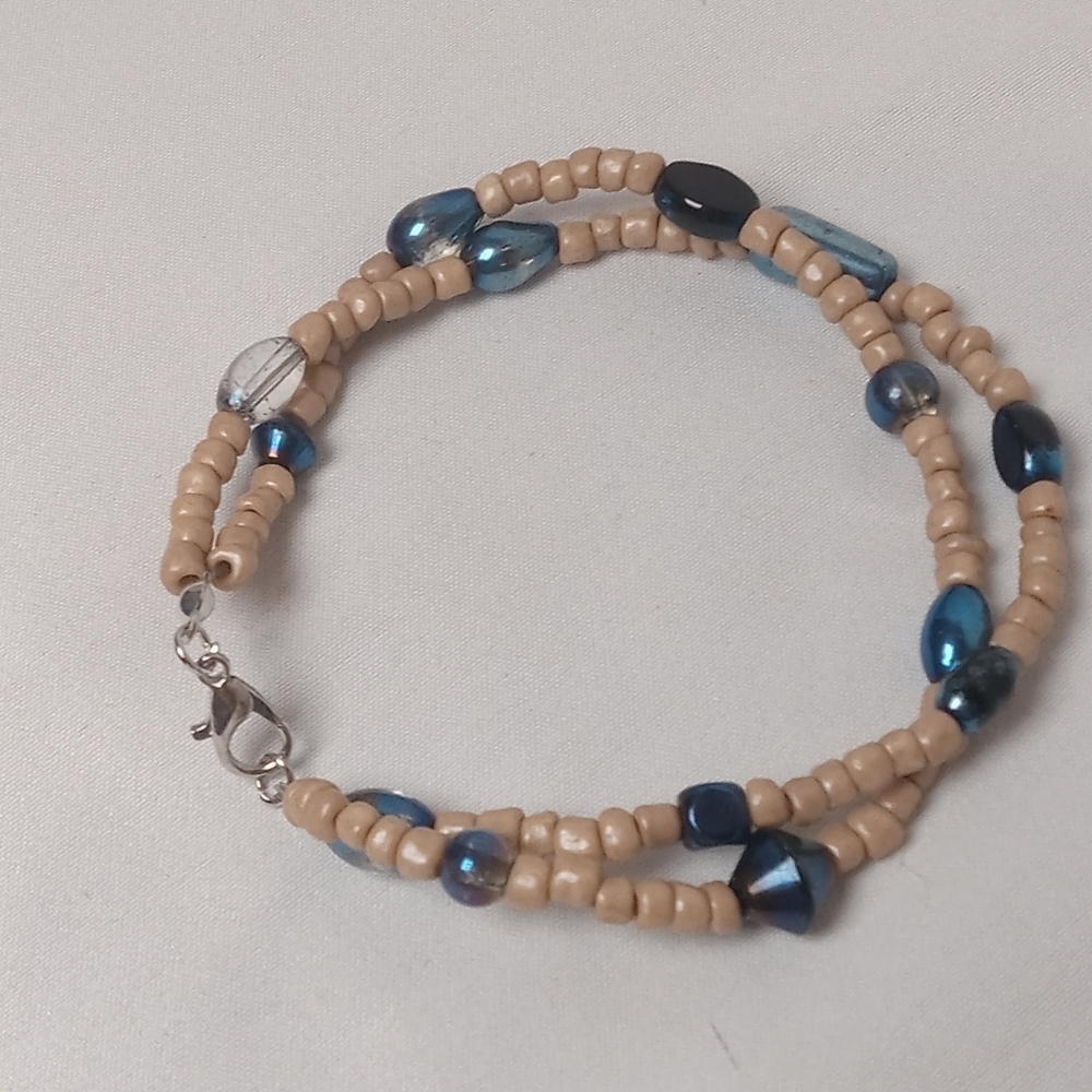 Hand Crafted Blue Beaded Bracelet with Intricate Design